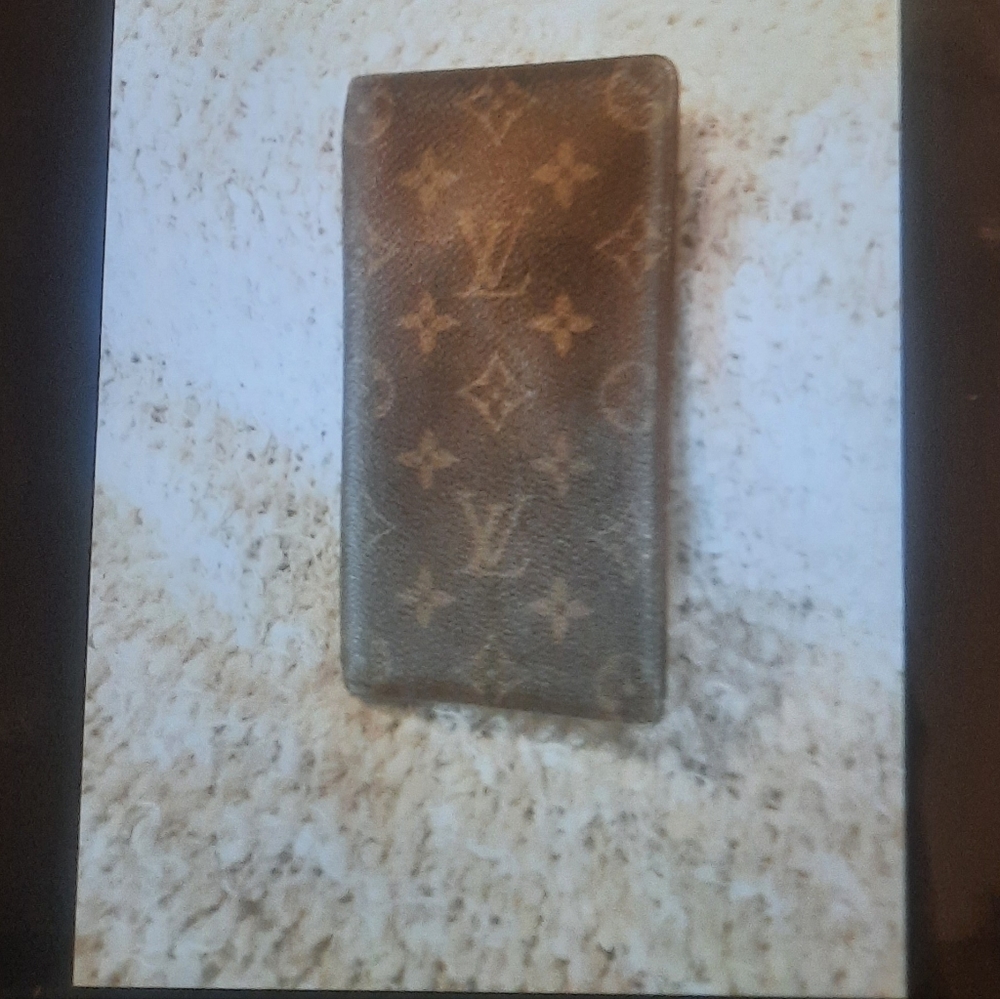 Louis Vuitton Porte Valeurs Monogram slim wallet.